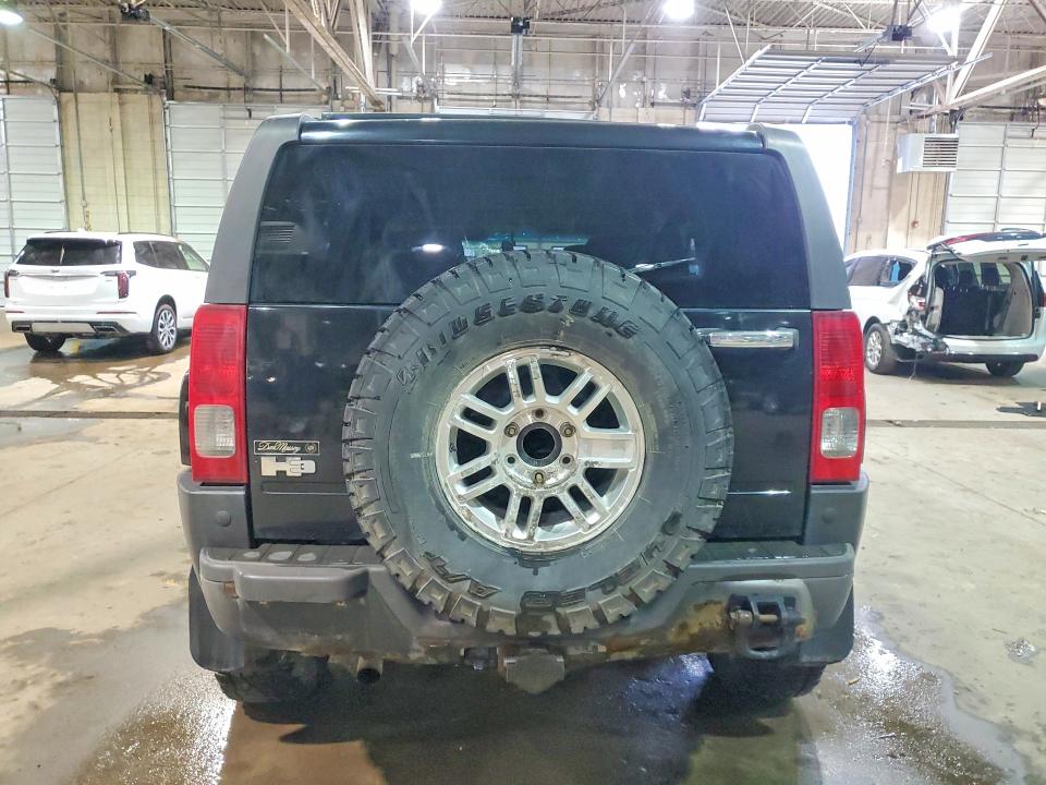 Photo 6 from auction – 2006 HUMMER H3 with VIN 5GTDN136268323090