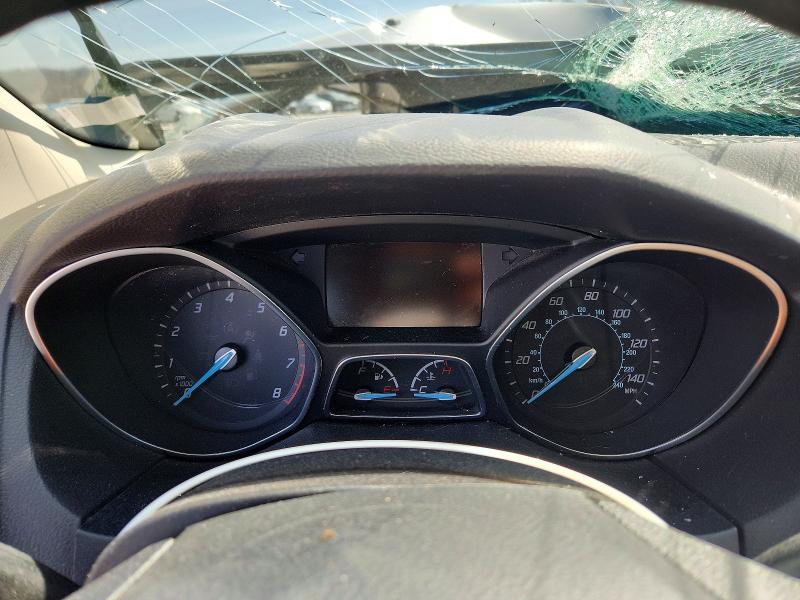 Photo 9 from auction – 2014 FORD FOCUS with VIN 1FADP3F28EL329449
