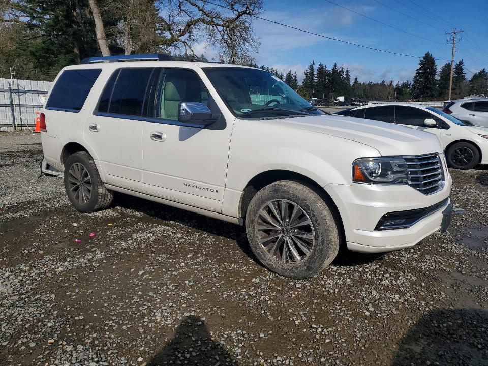 Photo 4 from auction – 2015 LINCOLN NAVIGATOR with VIN 5LMJJ2HT2FEJ02416