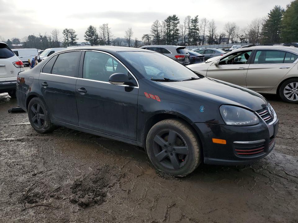 Photo 4 from auction – 2009 VOLKSWAGEN JETTA with VIN 3VWRZ71KX9M017398
