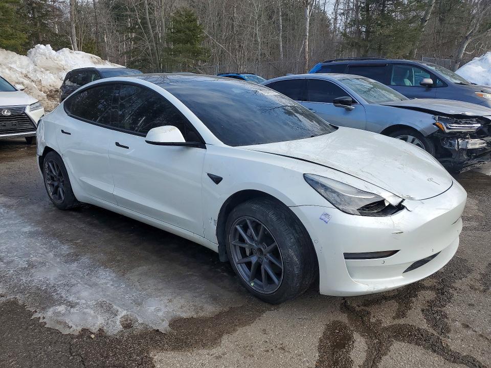 Photo 4 from auction – 2021 TESLA MODEL 3 with VIN 5YJ3E1EA7MF852309