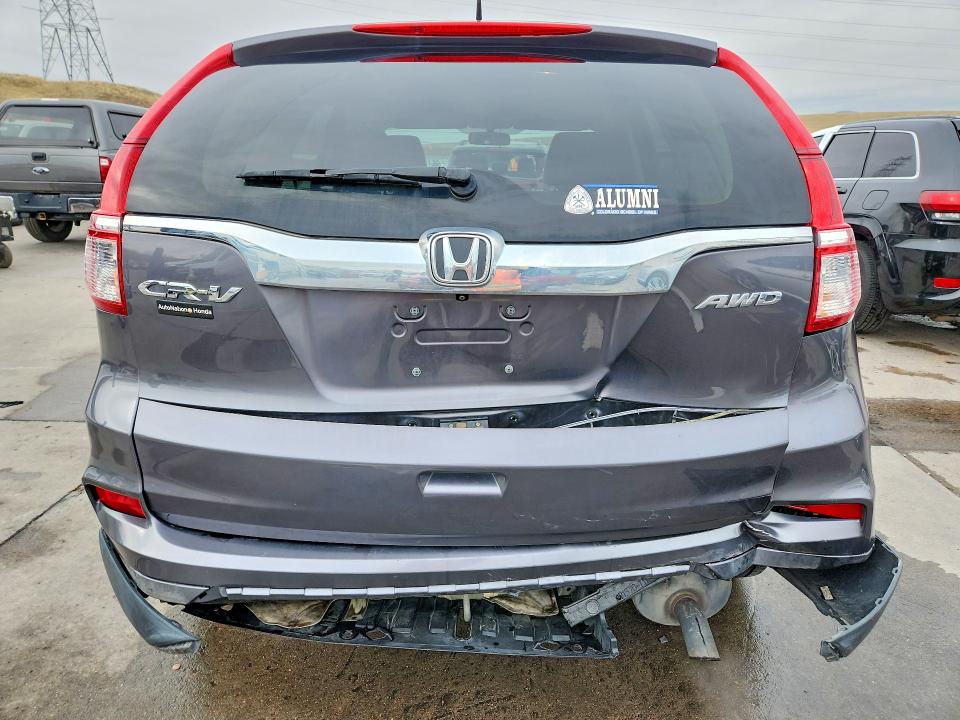 Photo 6 from auction – 2015 HONDA CR-V with VIN 2HKRM4H5XFH702292