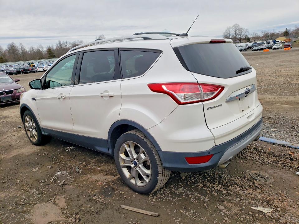 Photo 2 from auction – 2014 FORD ESCAPE with VIN 1FMCU9JX1EUE32173