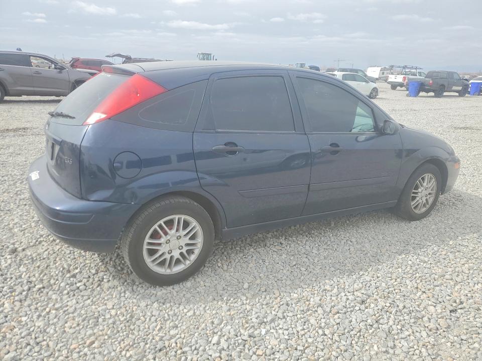 Photo 3 from auction – 2003 FORD FOCUS with VIN 3FAHP37333R106016