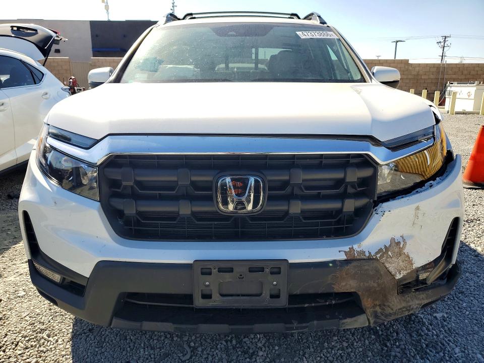 Photo 5 from auction – 2025 HONDA RIDGELINE with VIN 5FPYK3F56SB018385