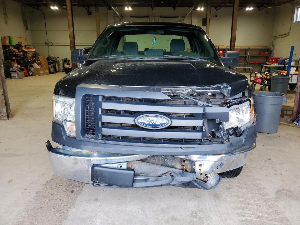 Photo 5 from auction – 2011 FORD F150 with VIN 1FTMF1CMXBKD29669