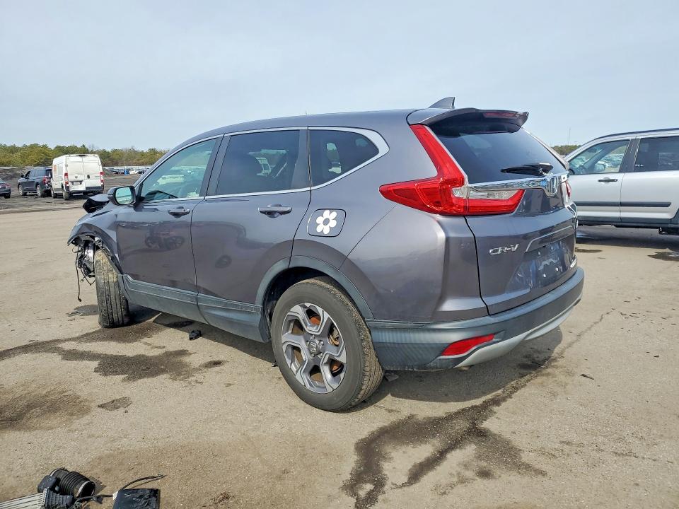 Photo 2 from auction – 2018 HONDA CR-V with VIN 7FARW2H54JE059111