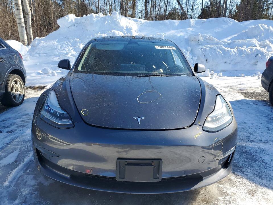 Photo 5 from auction – 2022 TESLA MODEL 3 with VIN 5YJ3E1EA1NF258039