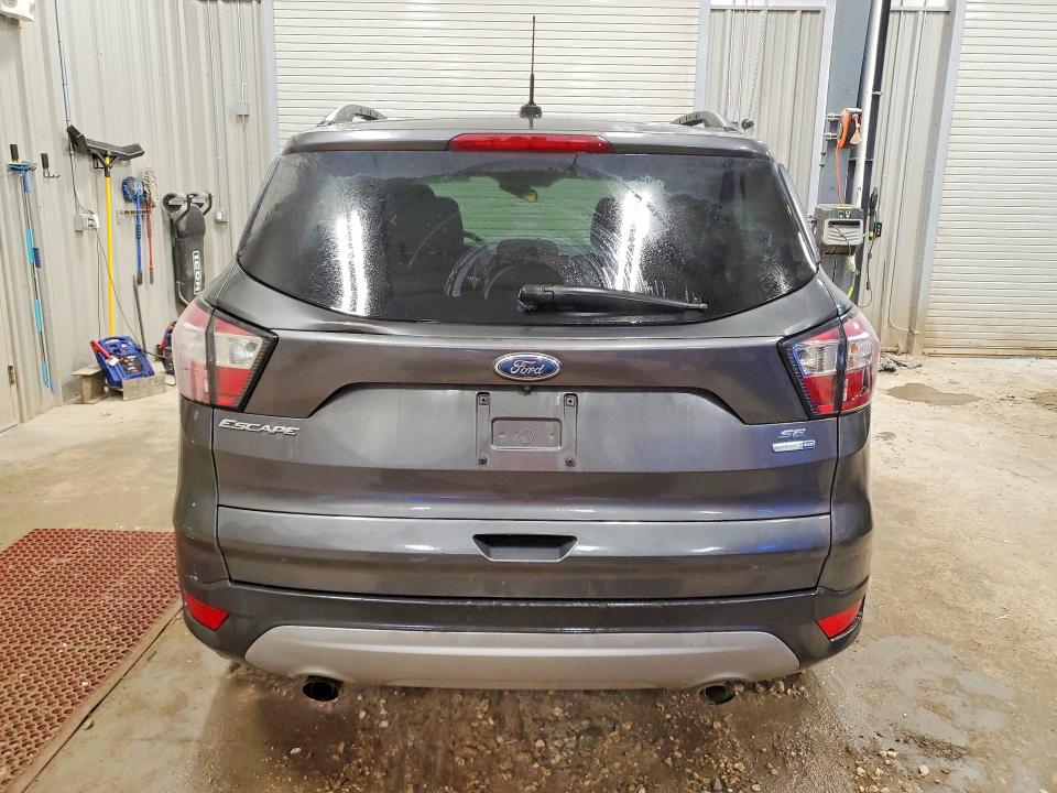 Photo 6 from auction – 2018 FORD ESCAPE with VIN 1FMCU9GD8JUB75925