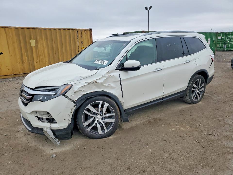 HONDA PILOT 2017 with VIN 5FNYF6H91HB028958 - Photo from auction