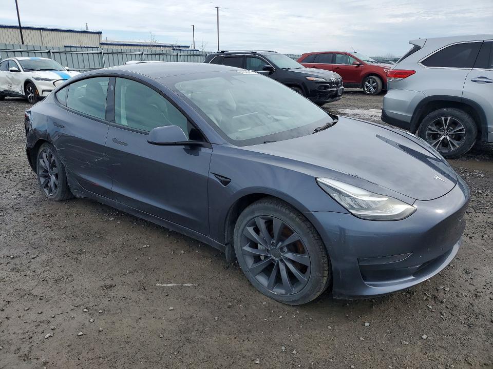 Photo 4 from auction – 2022 TESLA MODEL 3 with VIN 5YJ3E1EA1NF258185