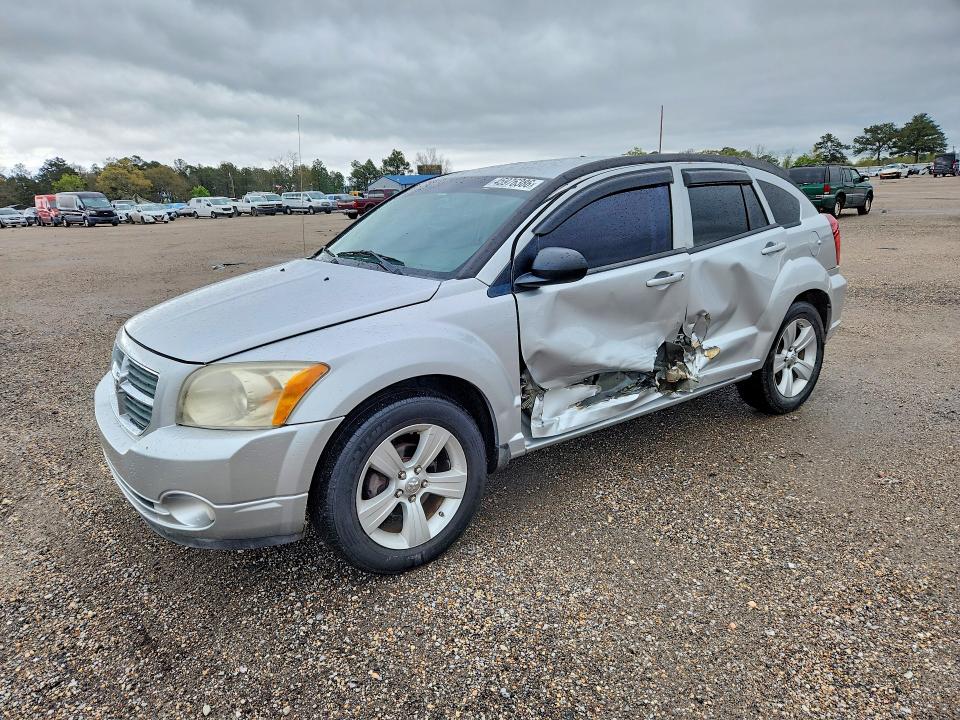 DODGE CALIBER 2010 with VIN 1B3CB3HA6AD567217 - Photo from auction