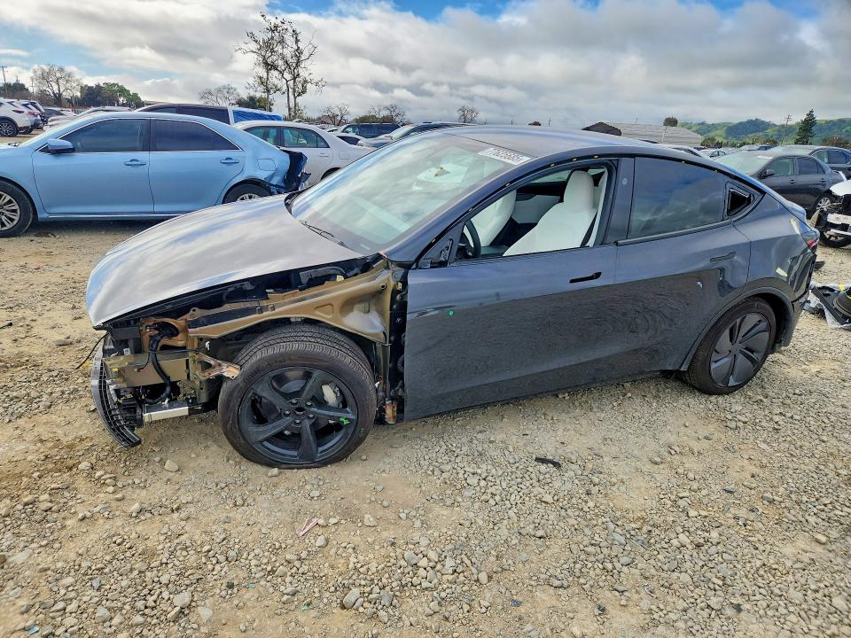 TESLA MODEL Y 2026 with VIN 7SAYGDED3TF399691 - Photo from auction