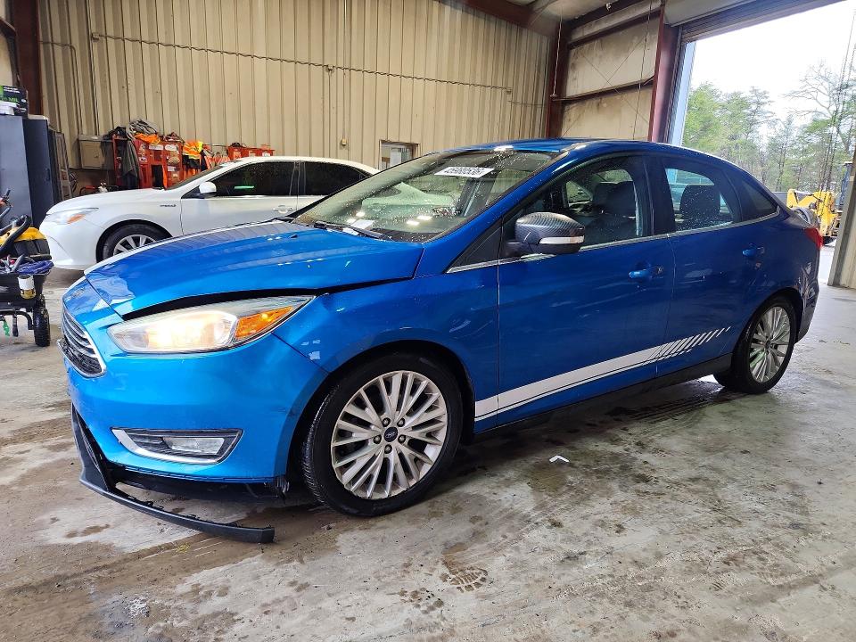FORD FOCUS 2016 with VIN 1FADP3J21GL363761 - Photo from auction