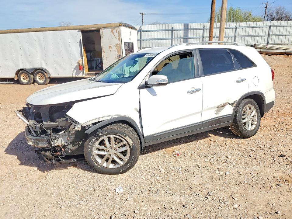 KIA SORENTO 2015 with VIN 5XYKT4A64FG594217 - Photo from auction