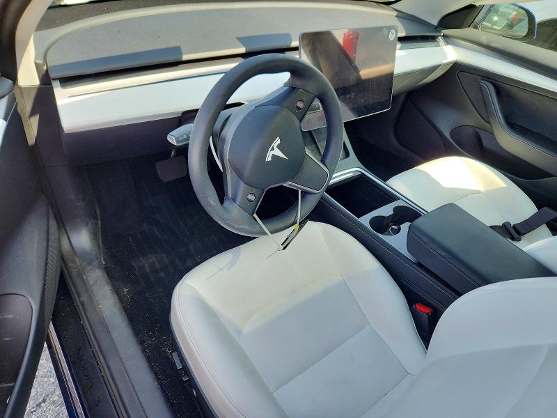 Photo 8 from auction – 2023 TESLA MODEL 3 with VIN 5YJ3E1EA8PF704920