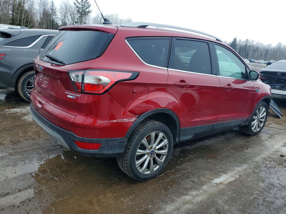 Photo 3 from auction – 2018 FORD ESCAPE with VIN 1FMCU9J94JUC95788