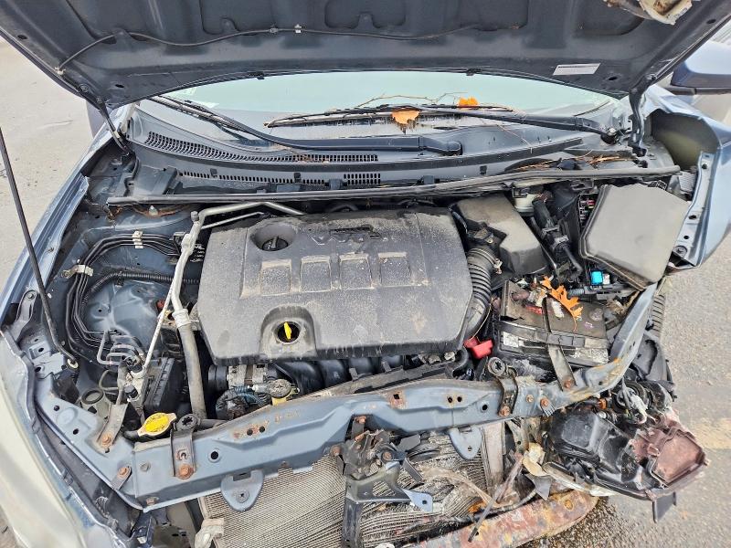 Photo 11 from auction – 2014 TOYOTA COROLLA with VIN 2T1BURHE8EC057724