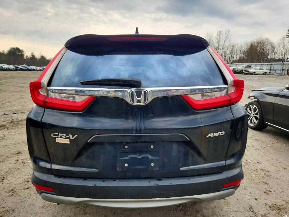 Photo 6 from auction – 2018 HONDA CR-V with VIN 7FARW2H87JE102026