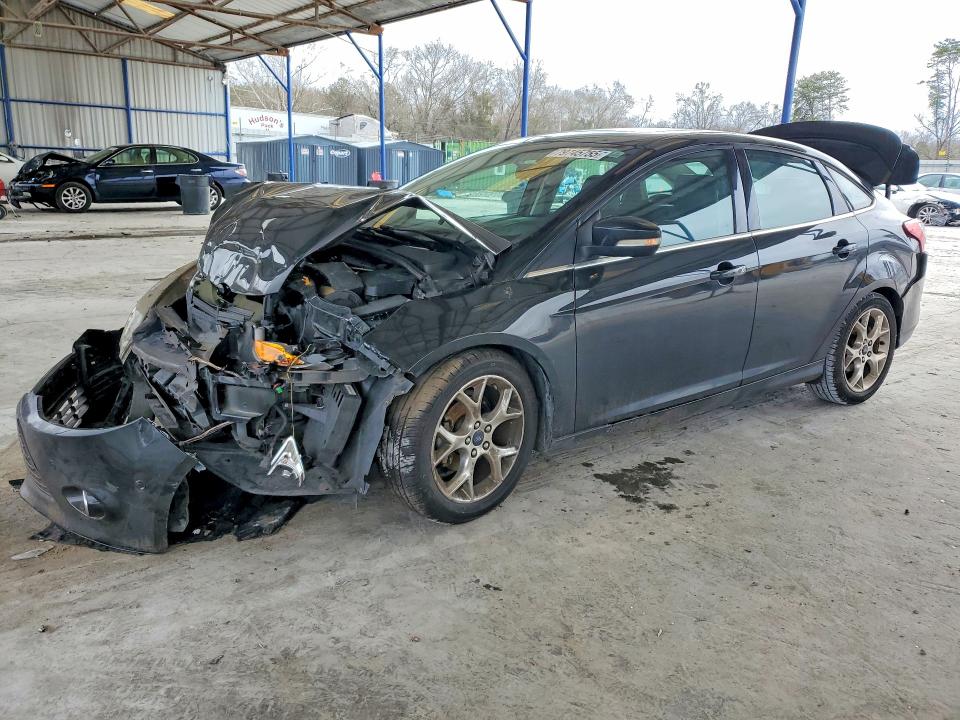 FORD FOCUS 2014 with VIN 1FADP3J27EL292241 - Photo from auction