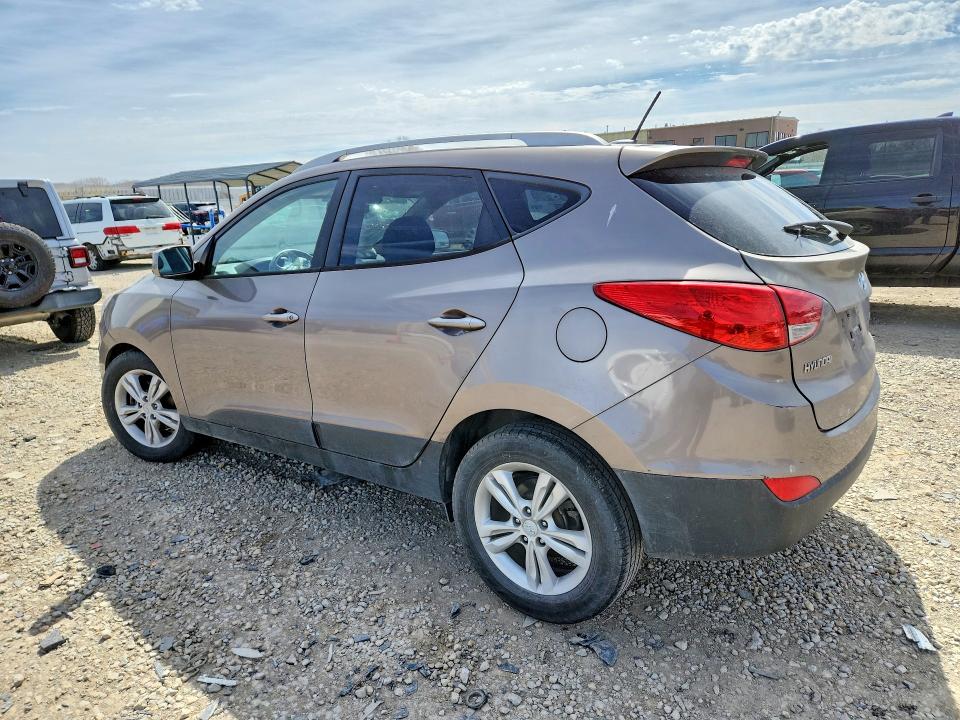 Photo 2 from auction – 2011 HYUNDAI TUCSON with VIN KM8JUCAC3BU201577