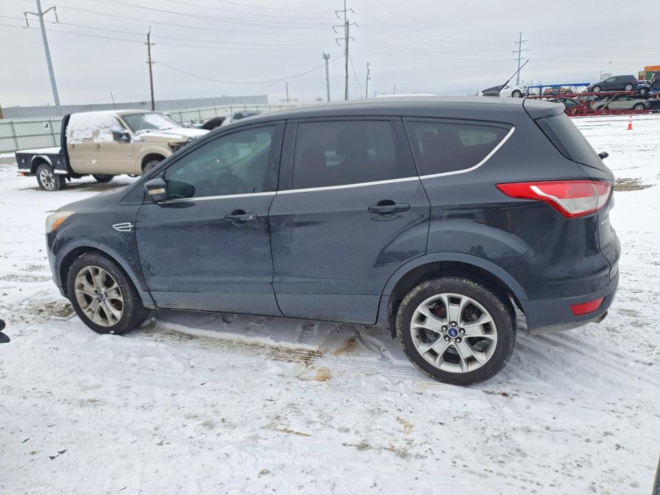 Photo 2 from auction – 2013 FORD ESCAPE with VIN 1FMCU9H92DUC77137