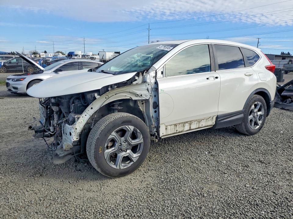 HONDA CR-V 2018 with VIN 5J6RW2H54JL015497 - Photo from auction