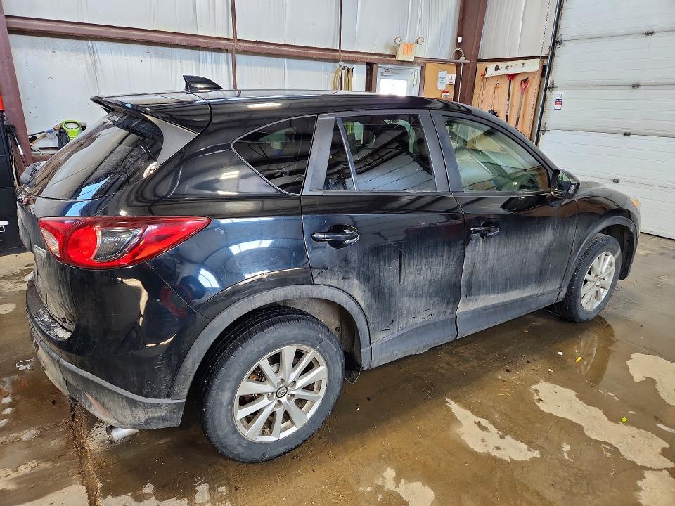 Photo 3 from auction – 2014 MAZDA CX-5 with VIN JM3KE2BE5E0342296