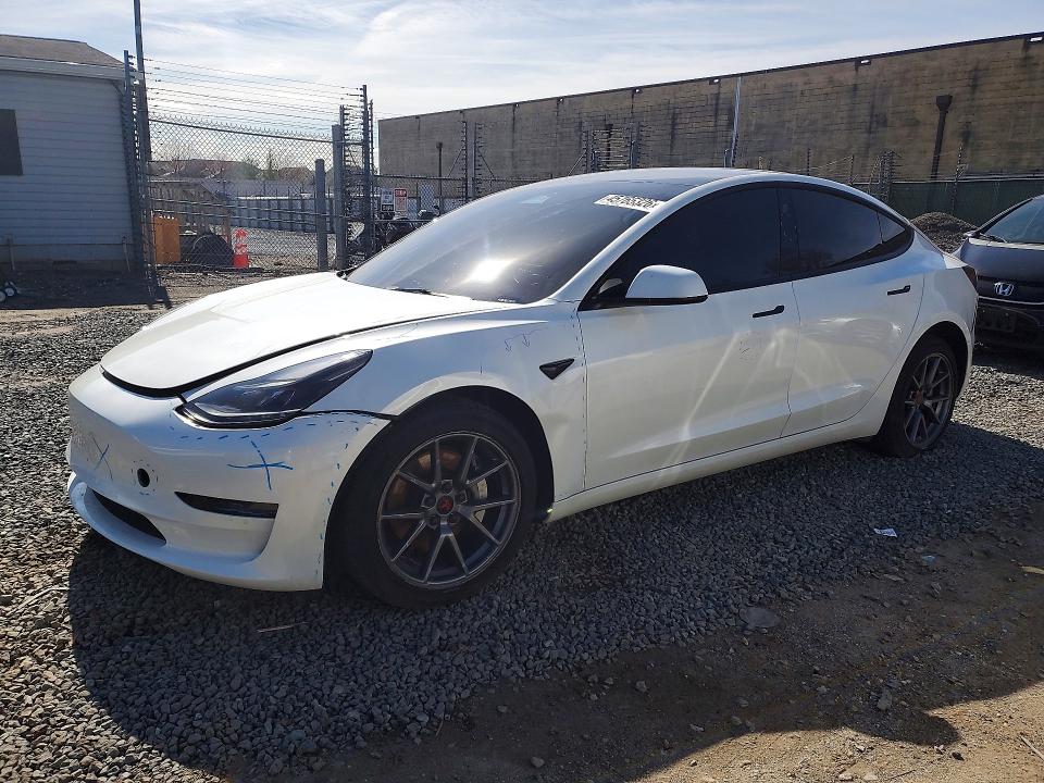TESLA MODEL 3 2023 with VIN 5YJ3E1EA6PF487612 - Photo from auction