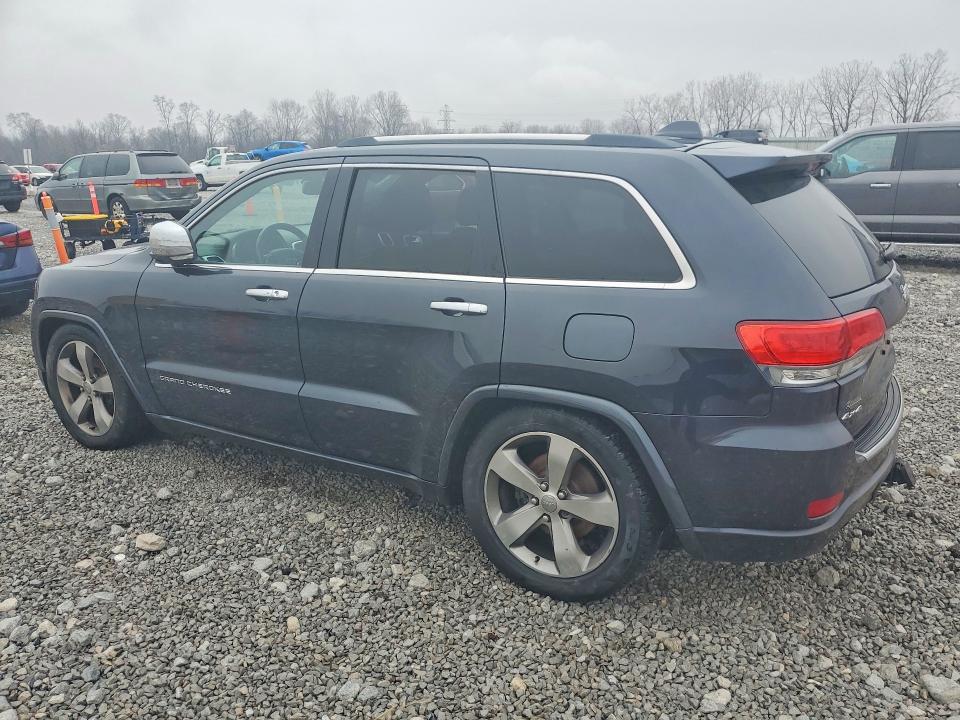 Photo 2 from auction – 2014 JEEP GRAND CHEROKEE with VIN 1C4RJFCG7EC474534