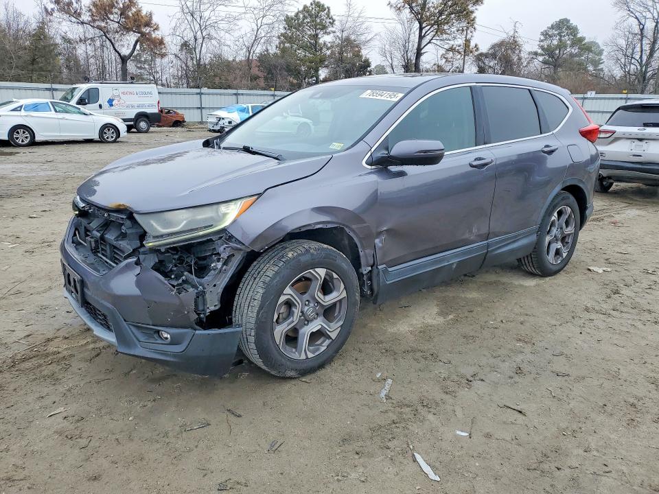 HONDA CR-V 2017 with VIN 7FARW1H5XHE011150 - Photo from auction