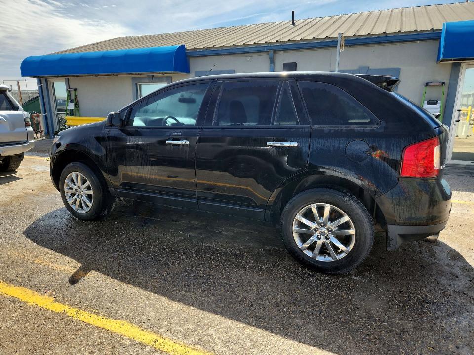 Photo 2 from auction – 2011 FORD EDGE with VIN 2FMDK3JC0BBB60723