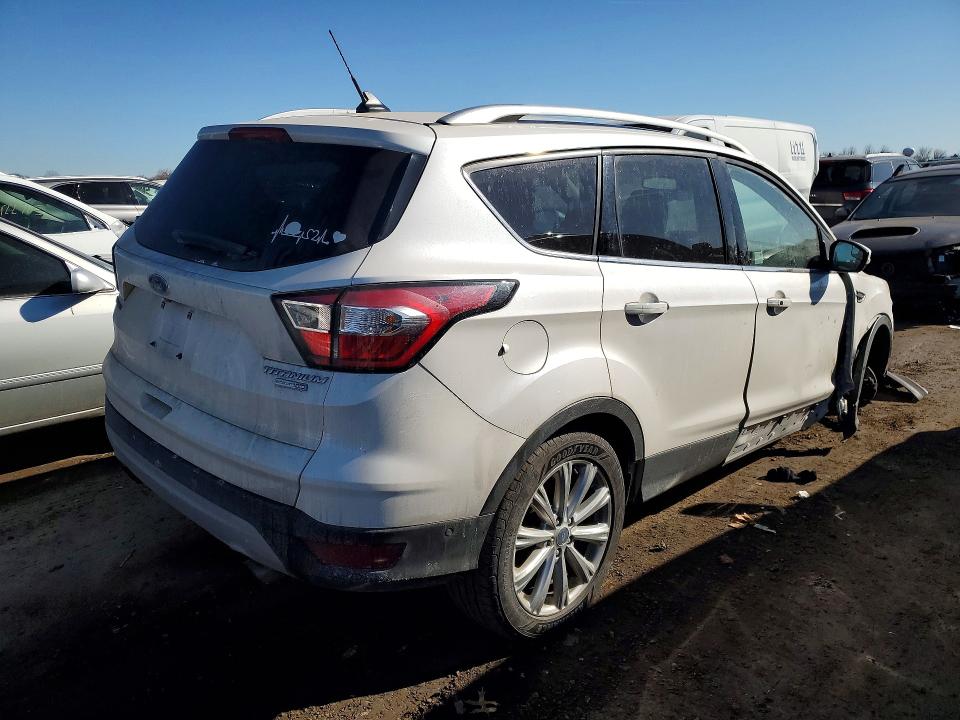 Photo 3 from auction – 2018 FORD ESCAPE with VIN 1FMCU9J98JUC11469