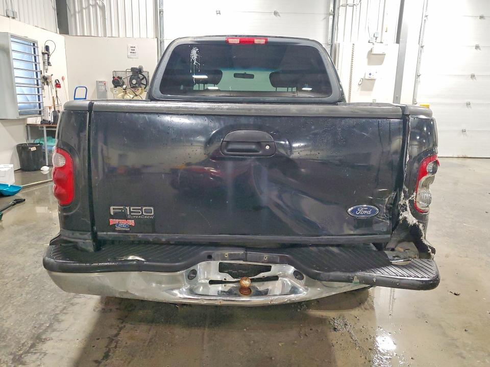 Photo 6 from auction – 2002 FORD F150 with VIN 1FTRW07652KD46147