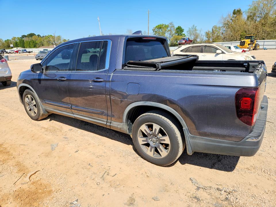 Photo 2 from auction – 2017 HONDA RIDGELINE with VIN 5FPYK2F65HB010502
