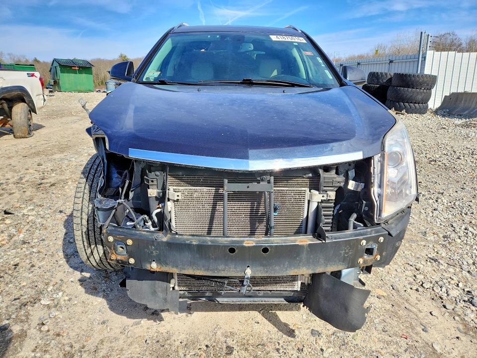 Photo 5 from auction – 2014 CADILLAC SRX with VIN 3GYFNFE39ES575984