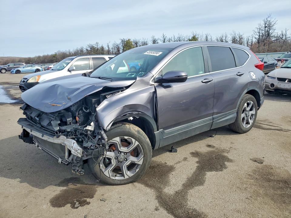 Photo 1 from auction – 2018 HONDA CR-V with VIN 7FARW2H54JE059111