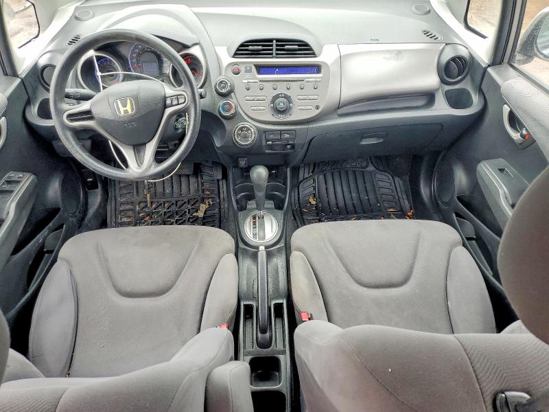 Photo 8 from auction – 2009 HONDA FIT with VIN JHMGE88549S804591