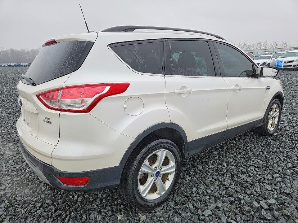 Photo 3 from auction – 2016 FORD ESCAPE with VIN 1FMCU9G97GUB26283