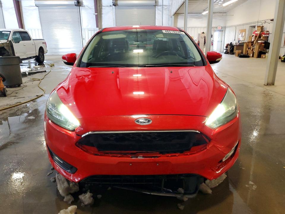 Photo 5 from auction – 2015 FORD FOCUS with VIN 1FADP3F2XFL220668