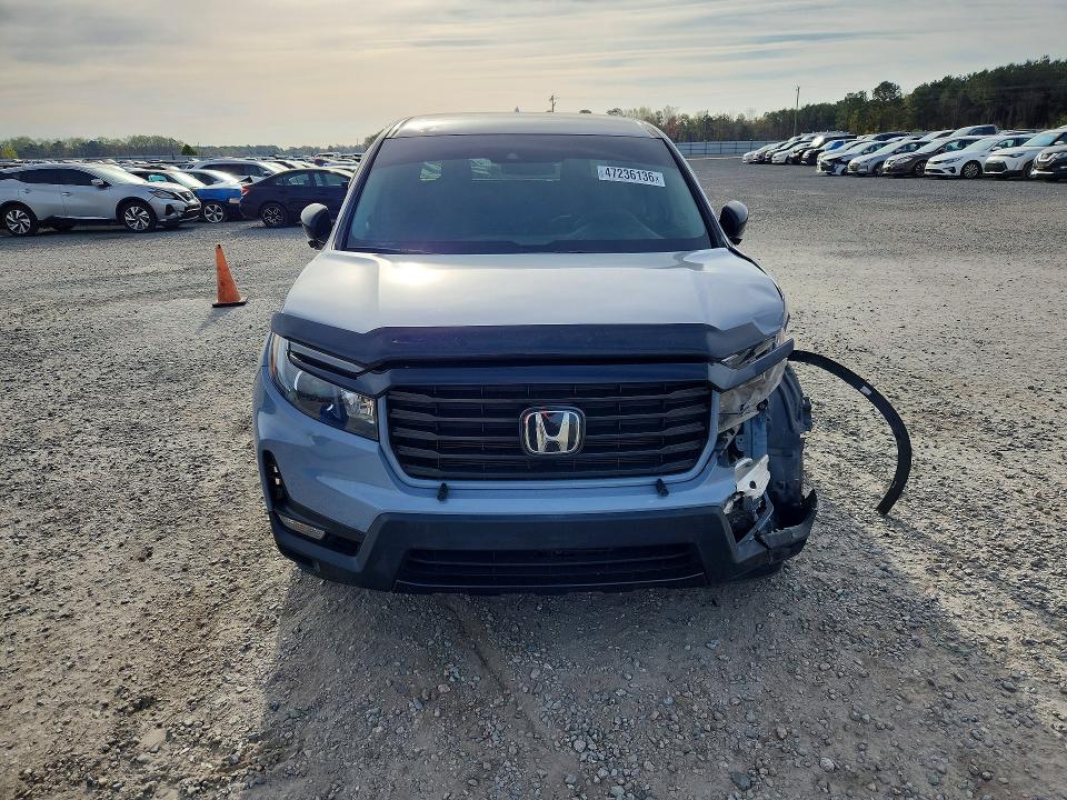 Photo 5 from auction – 2022 HONDA RIDGELINE with VIN 5FPYK3F16NB015732