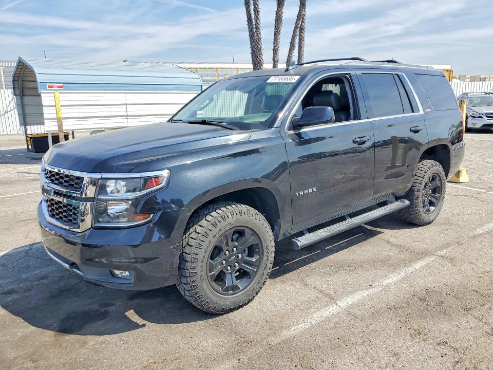 CHEVROLET TAHOE 2018 with VIN 1GNSKBKC6JR141018 - Photo from auction