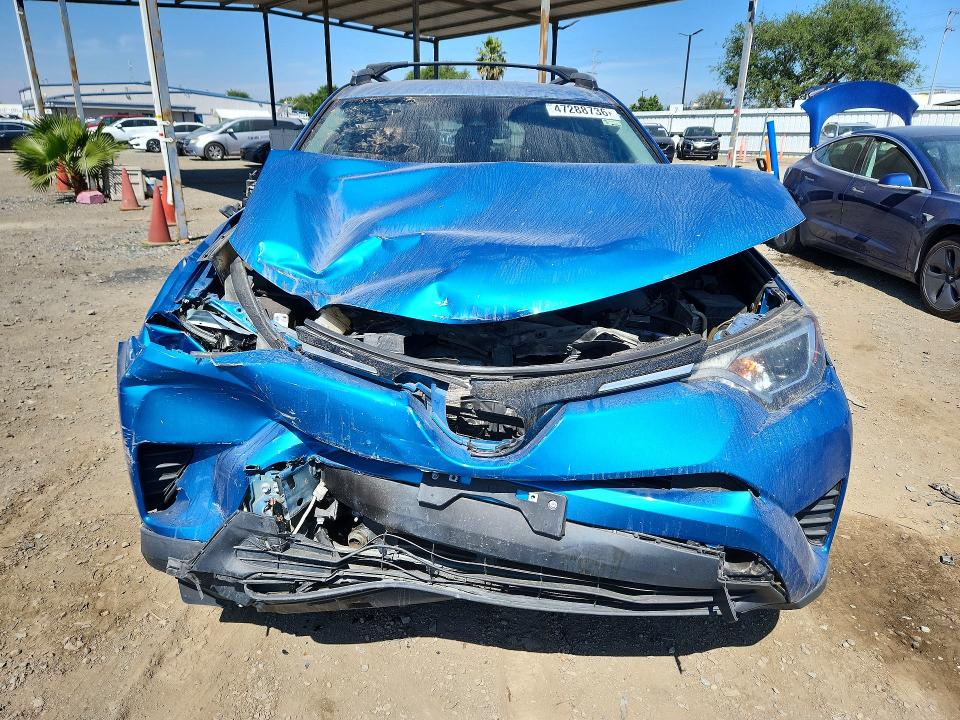 Photo 5 from auction – 2018 TOYOTA RAV4 with VIN 2T3ZFREV4JW495220