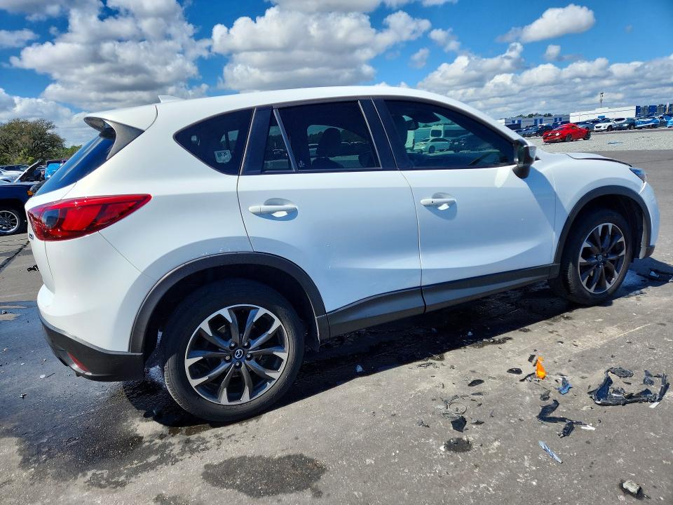 Photo 3 from auction – 2016 MAZDA CX-5 with VIN JM3KE4DY9G0843097