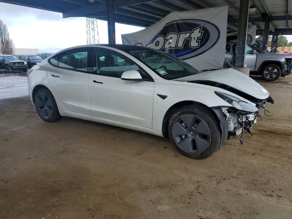 Photo 4 from auction – 2023 TESLA MODEL 3 with VIN 5YJ3E1EA9PF555448
