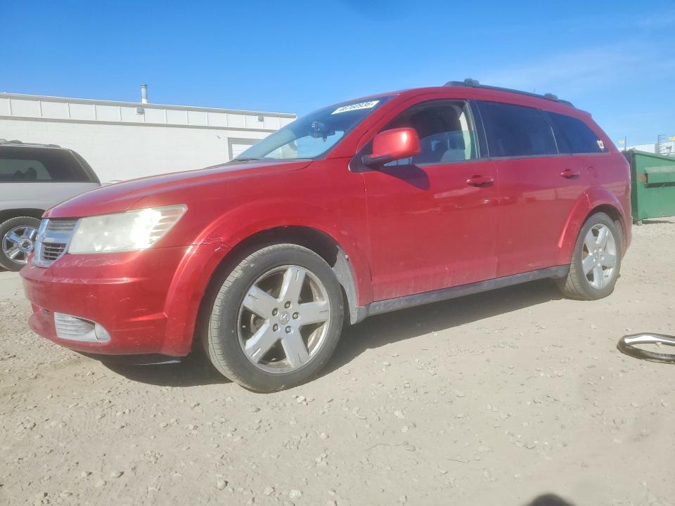 DODGE JOURNEY 2010 with VIN 3D4PH5FV9AT122645 - Photo from auction