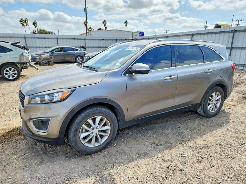 KIA SORENTO 2016 with VIN 5XYPG4A36GG075994 - Photo from auction