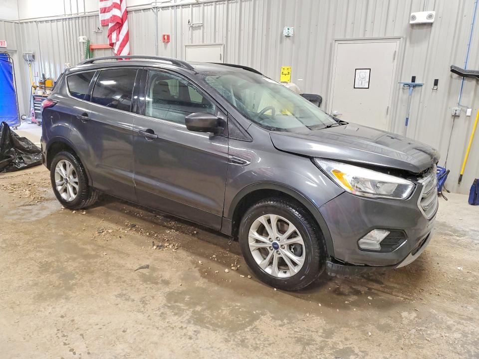 Photo 4 from auction – 2018 FORD ESCAPE with VIN 1FMCU9GD8JUB75925