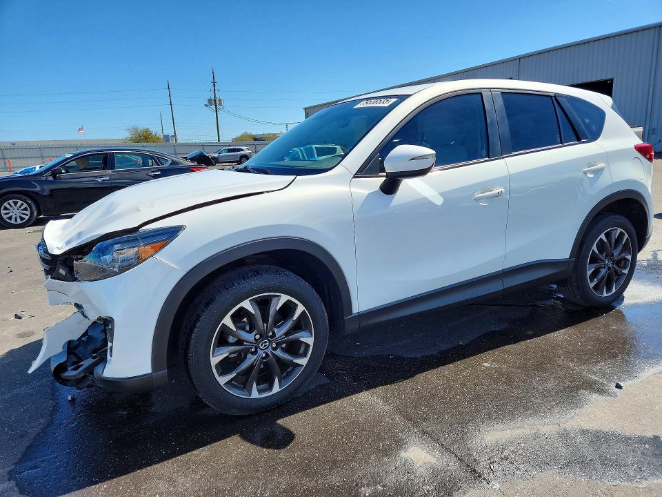 MAZDA CX-5 2016 with VIN JM3KE4DY9G0843097 - Photo from auction