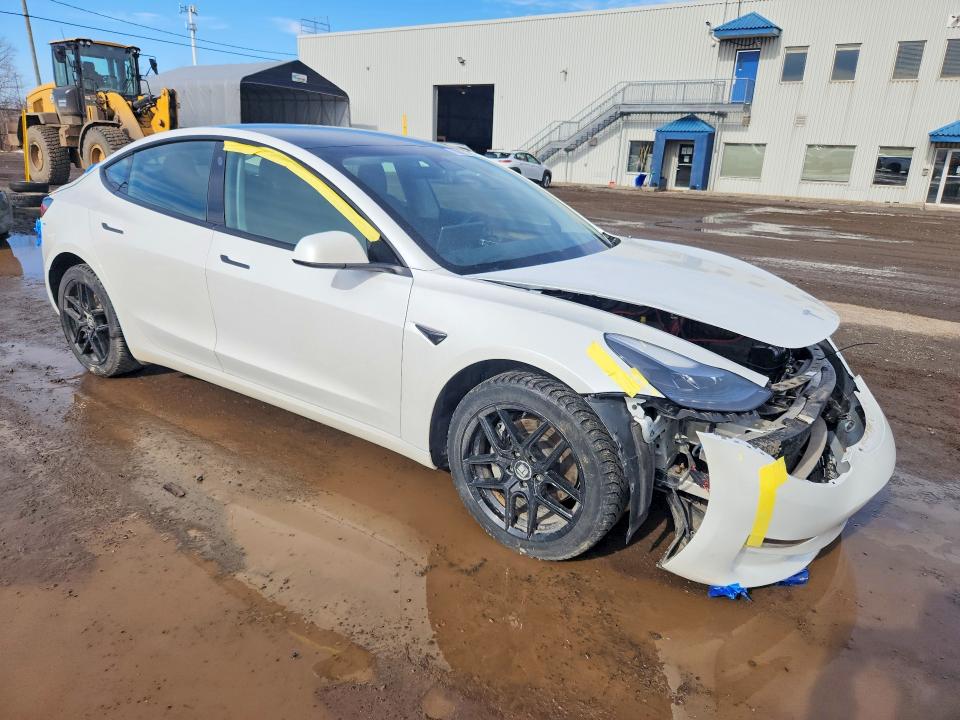 Photo 4 from auction – 2023 TESLA MODEL 3 with VIN LRW3E1EB9PC875551